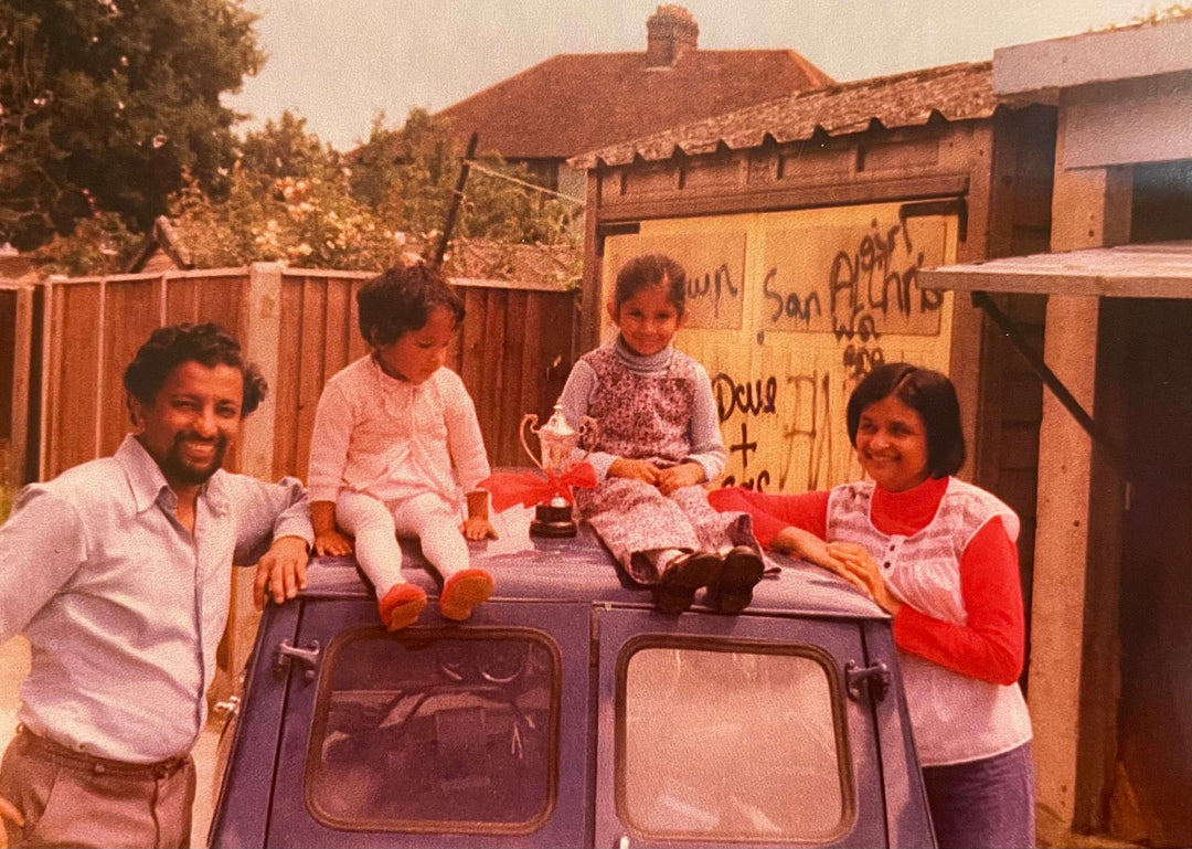 Fatema as a child with her parents and sister