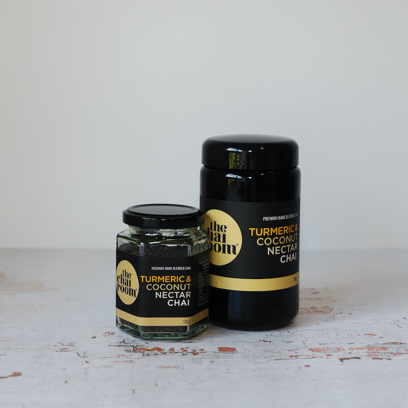 Jar of 100g Turmeric & Coconut Nectar Chai alongside a large jar of the same product