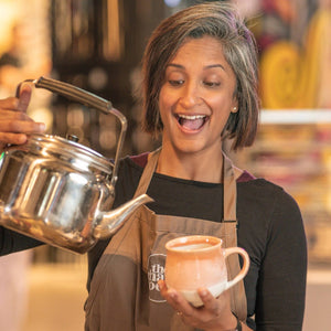 Fatema pouring chai